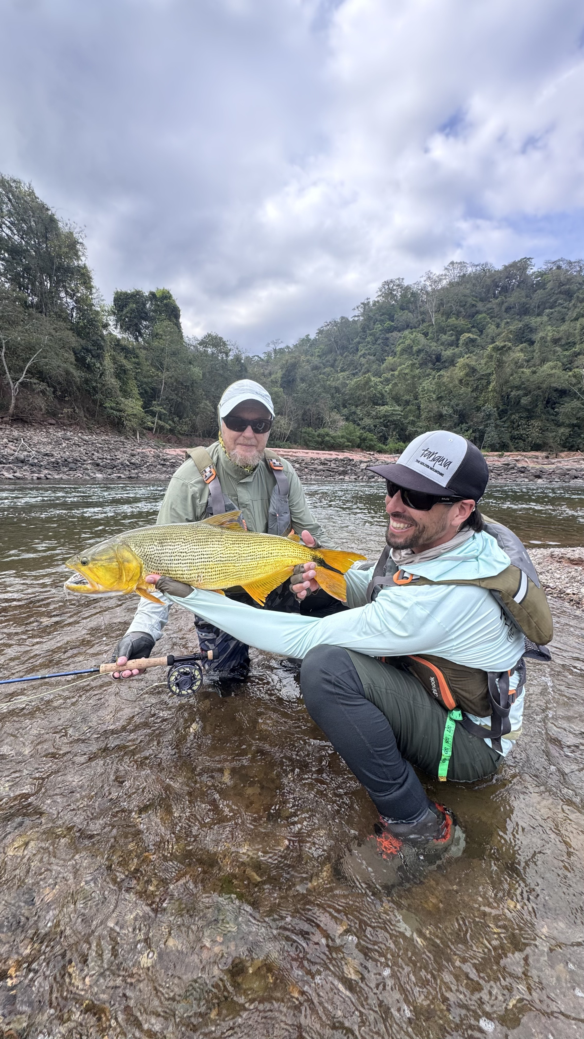 Two anglers with a dorado on the second day