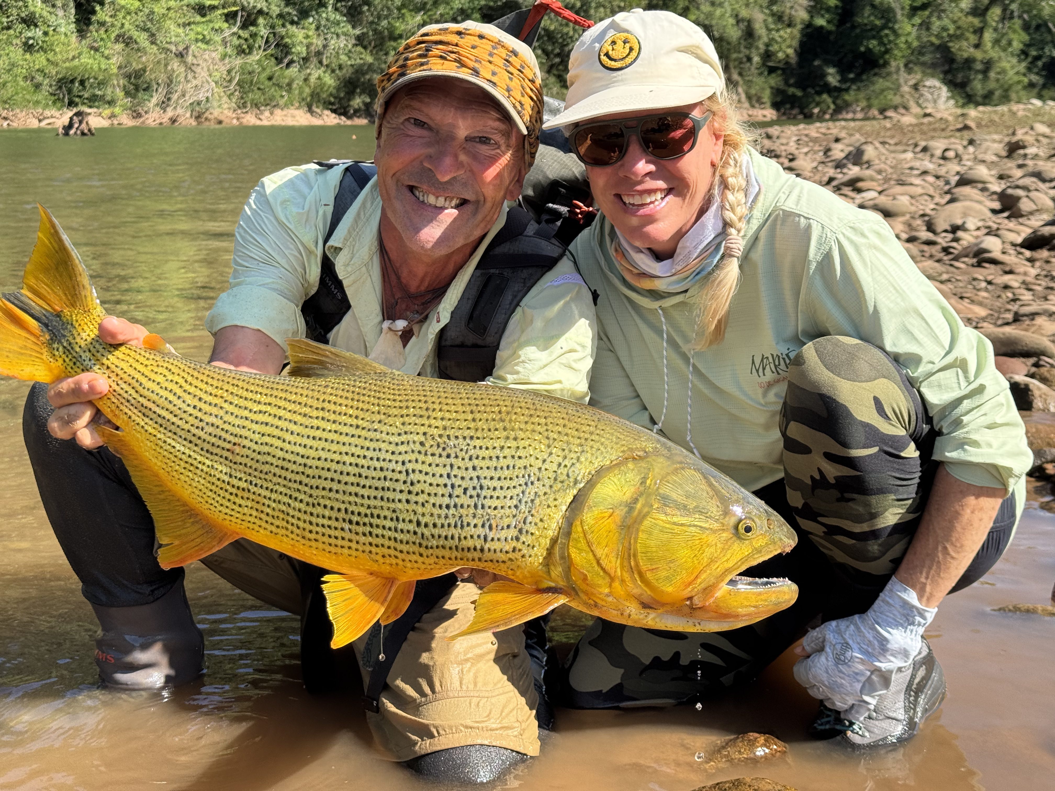 Amy with the 16-pound dorado she intercepted in clear, low water