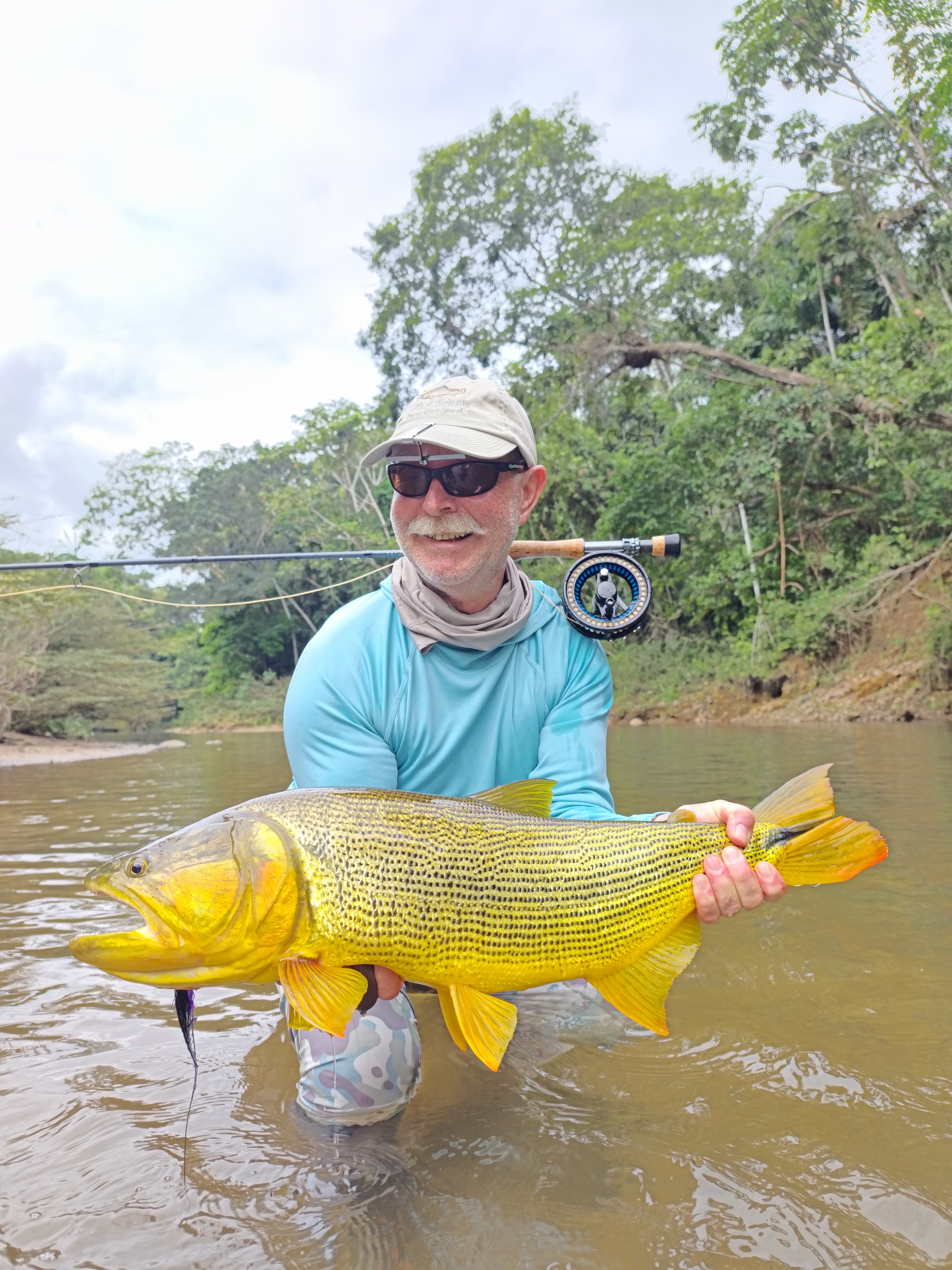 Konrad with the dorado he landed on the way to camp
