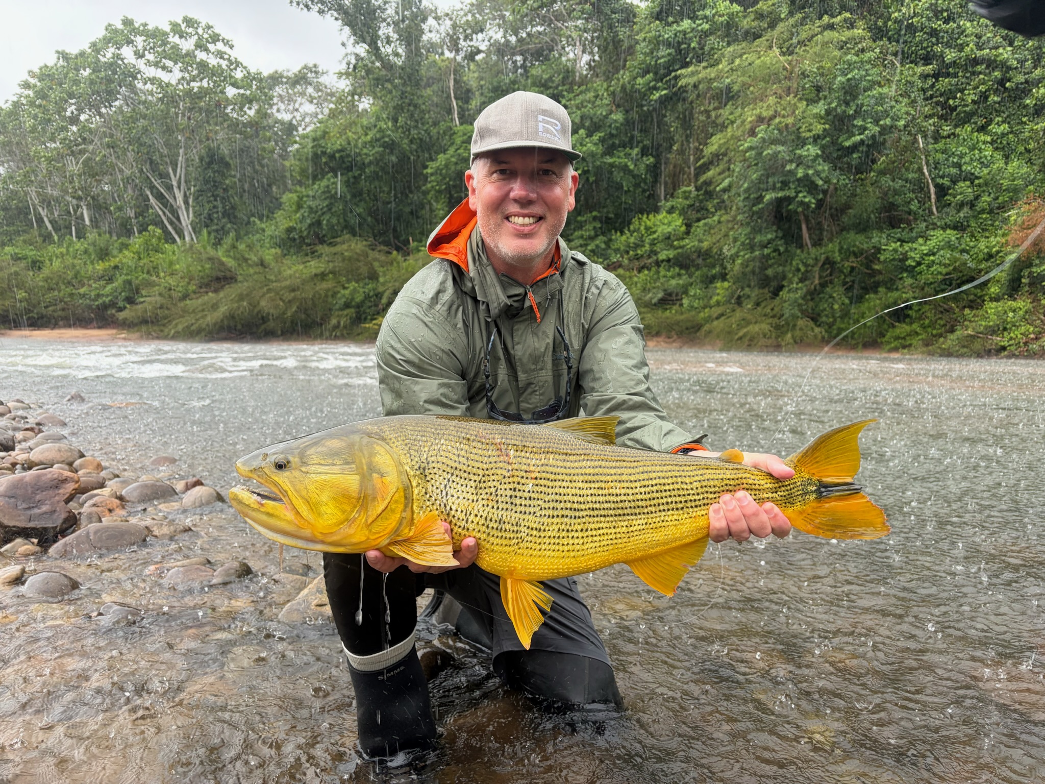 A dorado landed as the rain kept falling
